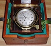 C.1860, English, Barraud-Maker to the Royal Navy, 41 Cornhill, London 2-Day chronometer, No. 2635 in a Cuban mahogany case with brass corners, the very top cover replaced, and with a C.1941 Hamilton outer case, felt lined. 