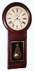 C.1855, Henry Terry, Plymouth, Conn, Office Regulator, Striking, 2-weight, 8-day in a rosewood and grained case. Both the case and movement were designed by Henry's brother Silas. Henry funded S.B. Terry's business in 1949, and a few styles of clocks appear with only the label of Henry Terry, such as this one. The movement is virtually identical to that used by Seth Thomas in their striking "No.1-Extra", since they purchased the right to manufacture the several regulator designs of S. B. Terry in 1859 for $750. Movement has maintaining power and dead-beat escapement. 