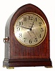 C.1916, Chelsea Clock Co., GOTHIC, 10" dial, eight-day time and house strike on gong, in a mahogany case with inlay. 