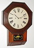C.1860, Atkins Clock Co., Octagon Drop XX, with 30 day double fusee time movement [round], in a rosewood case with ripple edge molding. 