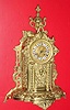 C.1890, French, Brass Cased Clock, in the form of a tabernacle, profusely decorated with twisty columns and geometric designs, and surmounted by similarly decorated urn, the well made movement, with a cast dial with individual cartouche numerals, and original hands. 