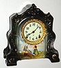 C.1904, Ansonia Royal Bonn, LA CANNES, porcelain china clock, 8-day time and gong strike, this version with 3 hand painted Dutch ladies mending nets at the shore, and boats in the distance. 
