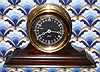 C.1985 Chelsea Clock Co., "The Chelsea" , with rare 4.5" 24 hour black dial/ white hands, eight-day Ship's Bell on a mahogany stand. 