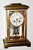 C.1913 [dated], French, Samuel Marti for Bailey Banks and Biddle, Philadelphia PA: Brass crystal regulator with 8-day time and strike movement and 2-glass vial pendulum. 