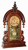 C.1880, Ansonia Clock Co., PARISIAN,  8-day parlor clock in black walnut, bell strike, and with fancy indicator pendulum. 