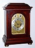 C.1920, German, Junghans, WESTIMINSTER Chime bracket or table clock, in a mahogany case and with embossed brass dial. 