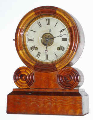 C.1870 E. Ingraham Clock Co., Bristol CT, GRECIAN MOSAIC, 8 day spring driven, time and strike W/ alarm, shelf clock in contrasting dark and light veneered walnut case. — Antique Clocks Price Guide