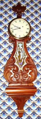 C.1972 [dated]. Elmer O. Stennes, Weymouth, Mass, Lyre Banjo, in solid mahogany, with signed movement and dial. — Antique Clocks Price Guide