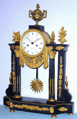 C.1830, French, Mathieu, a' Rouen, Empire Style Portico clock, black marble and ormolu, and with a large round movement with silk thread suspension. — Antique Clocks Price Guide