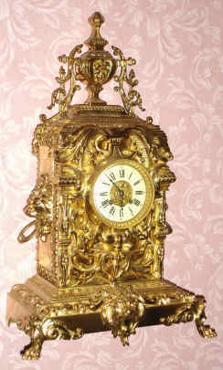 C.1890, French, Large Brass Mantel clock, profusely decorated with torches and urns and with 3 lions [sides and lower front]. 8-day, striking. — Antique Clocks Price Guide