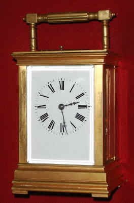 C.1895, French, Brass, Anglaise Cased Carriage clock, 5-Minute repeating, and hour striking, 8-day, platform lever, with hour button on top and the 5-minute button just under the rear lip of the case, and the 5-minute snail on the rear plate as well, original platform. — Antique Clocks Price Guide