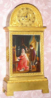 C.1840, French, Fine Ormolu Mantel Clock, with a hand painted porcelain plaque of two early-19C musicians in court dress, a lady playing the piano or harpsichord, and a gentleman playing a mandolin, displayed in a classic Empire case with cast decorations, a harp on each side, and the silk thread movement with the markings UE-188 and with matched number pendulum. — Antique Clocks Price Guide
