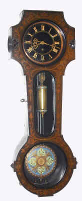 C.1865, German, Gustav Becker, Freiburg-i/S, 1-Wt Vienna Regulator, in an inlaid case. The movement with black porcelain dial and gilt numerals, pendulum with multi color cloisonne enamel, and the special pulley with black enamel inlay, and the original weight with enamel trim caps top and bottom, orig movement serial No. 146490 — Antique Clocks Price Guide
