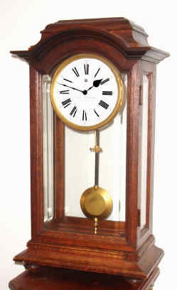 C.1900, Josef Neudhart, Graben 21, Wein I, unusual mantel regulator, the well made movement upside down with the Brocot style verge at the bottom of the movement, and the pendulum similarly suspended behind the 6 (likely that Neudhart attended clock makers school in France). — Antique Clocks Price Guide
