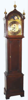 C.1900, English, for Theodore B. Starr, New York, rolling moon, time and strike brass dial tall clock, in an English oak case. — Antique Clocks Price Guide