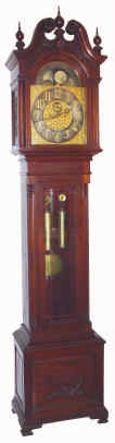 C.1905, English, ELLIOTT, LONDON, for Tiffany and Co., New York, 2-Wt, Rolling moon tall clock, mahogany waisted, broken arch case with beveled glass in door, gong strike. — Antique Clocks Price Guide
