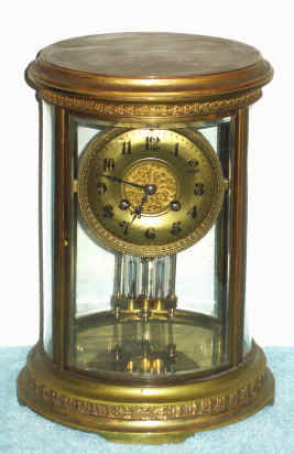 C.1895, French, S. Marti for Bailey Banks and Biddle Co., Oval 4-glass "crystal regulator", 8-day with 2 vial compensating pendulum intact. — Antique Clocks Price Guide