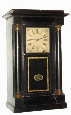 C.1854, A. D. CRANE, Newark, NJ (on label), an 8-day version of Crane's patent timepiece. Several of these were made in New Jersey as a last gasp effort to sell Cranes case design at a low cost using a Connecticut spring movement (note original Mills NY paper dial was also used in NJ). — Antique Clocks Price Guide