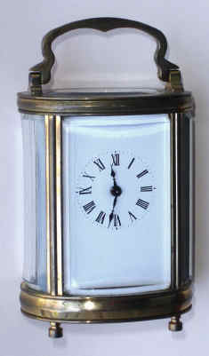 C.1910, French, Brass Cased Carriage timepiece, in a miniature oval case. — Antique Clocks Price Guide