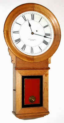 C.1890, E. Howard and Co., No.70 Regulator, in oak, 8-day weight driven, with restoration. — Antique Clocks Price Guide