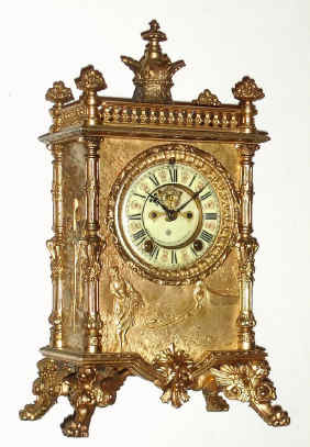 C.1904, Ansonia Clock Co., "ELITE", gilt white metal mantel clock, with fancy open escapement dial, 8-day, gong striking. — Antique Clocks Price Guide