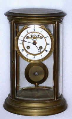 C.1900, French, OVAL 4-GLASS, or crystal regulator with open escapement and bell strike. — Antique Clocks Price Guide
