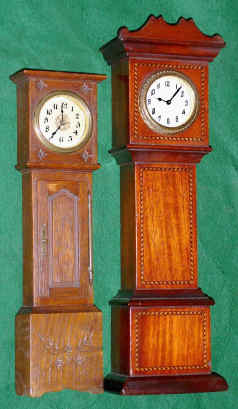 Mixed lot of two /2/ miniature 30 hour tall case timepieces: — Antique Clocks Price Guide