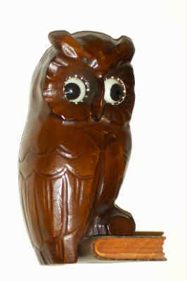 C.1960, German, Oswald, Rotating Eye clock in the form of an owl setting on a book, molded composition case. — Antique Clocks Price Guide