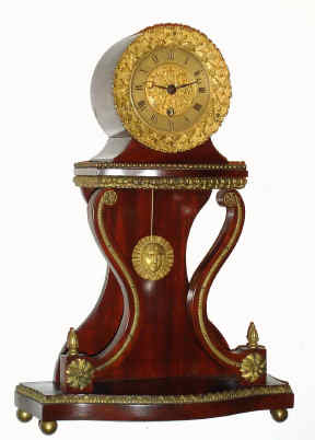 C.1840, French, J. B. Wilbor, Paris, interesting mahogany cased table timepiece, with a finely cast bezel and sunburst pendulum, silk thread suspension. — Antique Clocks Price Guide