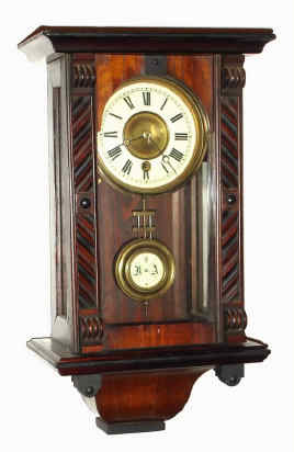 C.1900, German, Small 8-day time only wall clock, walnut case, less top and bottom finial. — Antique Clocks Price Guide