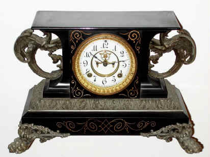 C.1904, Ansonia BELGIUM, Enameled iron mantel clock, open escapement on the dial. — Antique Clocks Price Guide