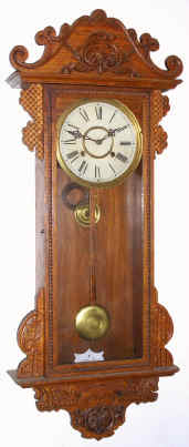 C.1906, Waterbury Clock Co., "ALTON" oak cased wall clock, with restorations. — Antique Clocks Price Guide