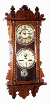 C.1891, Waterbury Clock Co. Calendar No. 36, double dial perpetual calendar, 8-day time with strike in walnut. — Antique Clocks Price Guide