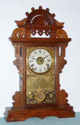 C.1890, Seth Thomas Clock Co., "Eclipse", 8-day time, strike and alarm ball top parlor clock. — Antique Clocks Price Guide