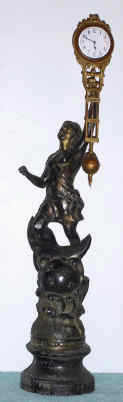 C.1905, German Swinger, Junghans, now on a spelter statue of the same period, by another firm. — Antique Clocks Price Guide