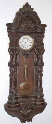 C.1910 Vienna Regulator, large molded clock, with an 8-day time only weight mov't. — Antique Clocks Price Guide