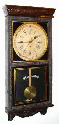 C.1915, Waterbury Clock Co., 8-day calendar wall timepiece, store regulator case. Label on the back reads: "A and W Regulator, New York". It appears that A and W was buying clocks from Waterbury and placing their label on the back. — Antique Clocks Price Guide