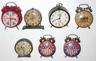 Mixed lot of seven alarm clocks, — Antique Clocks Price Guide
