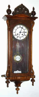 C.1890, German, R-A style wall regulator, now with another movement that is too "short" for this case [pend about 5" high]. — Antique Clocks Price Guide