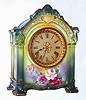 C.1914, Ansonia, Royal Bonn, "La Savoie" porcelain china clock, in a tri-color case, dark aqua to top, next yellow and a base of dark green; plus colorful floral decorations on the top and sides.