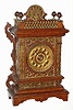 C.1894, Ansonia Clock Co., "CABINET - F", oak cased parlor clock in the Antique style with profuse brass decorations.