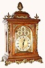 C.1890, German, Winterhalder and Hofmeier, Bells and Gongs, Triple Fusee, Qtr Chime bracket clock in oak with profuse bronze case trim.