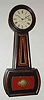 C.1890, E. Howard and Co., Boston, No. 5 Banjo, 8-day timepiece in a cherry case with applied rosewood graining, weight driven.