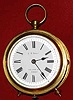 C.1886, French, "R. E. D." Cylinder or Drum shaped carriage clock, 1-fusee, two-plane lever, brass case consisting of a front and rear bezel separated by 6 turned pillars and a cylinder shaped glass allowing full of the rare movement. Porcelain dial bears the name: J. H. Hewitt, 308 High St, Lincoln.