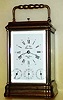 C.1980, French, L'Epee, Brass Cased carriage clock, time, strike, alarm and repeat, with calendar at bottom of the dial, with a bronze finish to the case (modern).