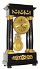 C.1860, French, "F-C", 4-Column Empire style mantel clock, in an ebonized case with gilt bronze mounts, (swags and floral elements) gilt dial and pendulum, and with original glass dome and base.