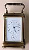 C.1900, Brass Cased Carriage Clock, Drocourt, for Vqr. Fleury, 23 Rue de la Paix, Paris, time, bell strike, repeat and alarm, in a Cannelee case.
