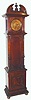 C.1895, German, Polyphon, Musical Tall clock, double comb Polyphon player, with Lenzkirch time and strike movement, in a closed walnut case, music plays at will with selector on left, or on the hour. Most similar to style 64; this one never had glass in door, has walnut panel. Plays 28cm center drive discs.