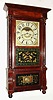 C.1839, Birge, Mallory and Co., Bristol, Conn, large Empire style column and cornice, mahogany veneer, with heavy strap brass movement, signed B M and Co.