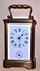 C.1900, French Brass Cased Carriage timepiece with alarm, and with a fancier dial with blue accents, in a Corniche case.